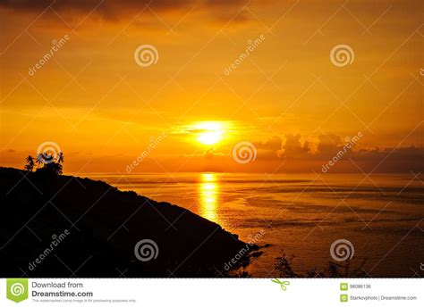 Silhouettes Of Palm Trees Bright Yellow Clouds Romantic Beach On A Tropical Island During
