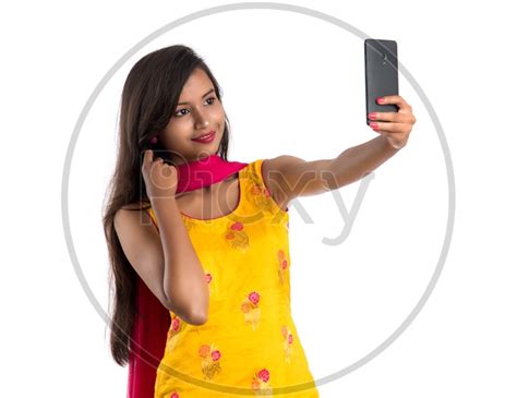 Image Of Beautiful Indian Girl Taking Selfie In Smart Phone Fh505877 Picxy