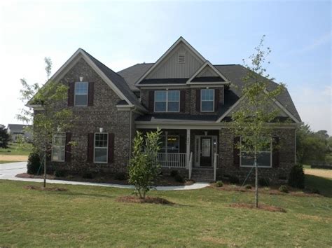 An exterior angle of a triangle is formed when one side of a triangle is extended. Katherine A with 3 Car Garage - Triangle Northampton Brick ...