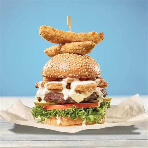 It's time to tuck into juicy, flavoursome pickles layered between melted cheese, ketchup sauce and toasted sesame seed. Burgers - Turtle Jack's
