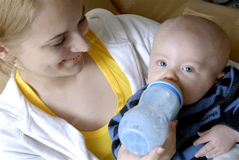 Mother Bottle Feeding Her Baby Stock Image M8310349 Science