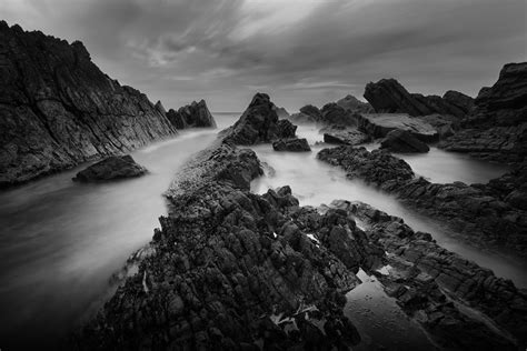 Grayscale Photography Of Rock Cliff Hd Wallpaper Wallpaper Flare