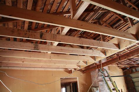 Pretty confident about moving them up a little (oregon code allows for rafter ties vs ceiling joists), big question is can i get away with removing. Nutmeg & Co: New Garage Beam