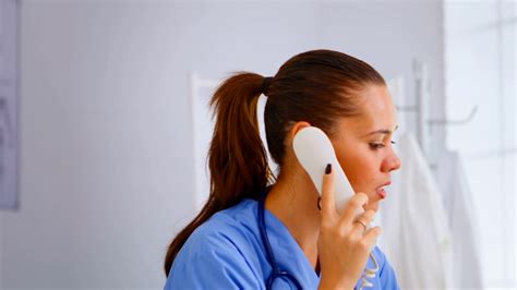 Medical Receptionist Answering Phone Calls Stock Footage Sbv 346391546