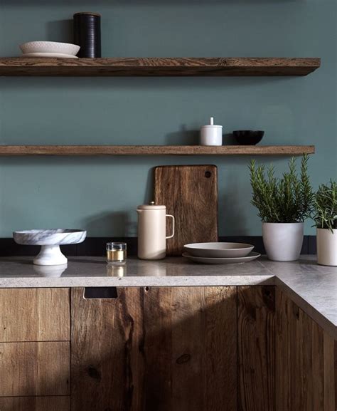 Chairs, sofas, tables, stools, storage Mid-tone natural wood cabinets, floating shelves, dark ...