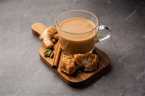 Premium Photo Jaggery Tea Or Gur Ki Chai With Ingredients Like Gud