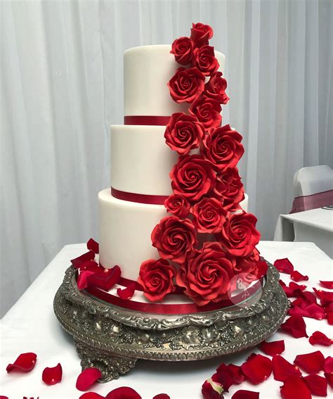 Simple And Elegant Wedding Cake With Cascading Red Sugar Roses 🌹