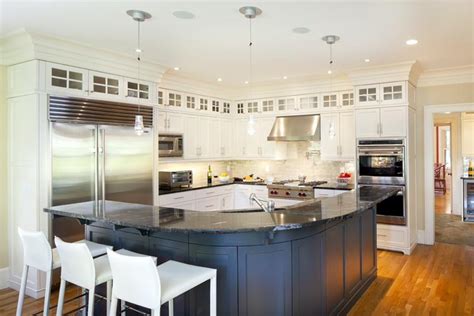 Some are stark contrast, like this white/black combo 20+ Two Tone Kitchen Cabinet Ideas and Styles - Home Awakening