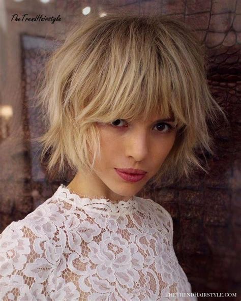 How to cut your own hair into a blunt, angled bob. Pin on short bob haircuts with bangs