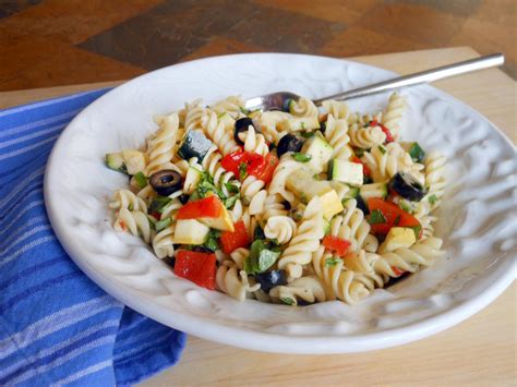 This summer pasta salad recipe is perfect for dinner on the patio, or packed ahead for a satisfying lunch. Summer Pasta Salad | Food Network Healthy Eats: Recipes, Ideas, and Food News | Food Network