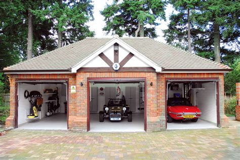 A Gorgeous Garage With Two Beautiful Classic Cars In A Perfect