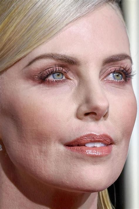Miscellaneous What Caused These Patterns In Charlize Therons Cheek At