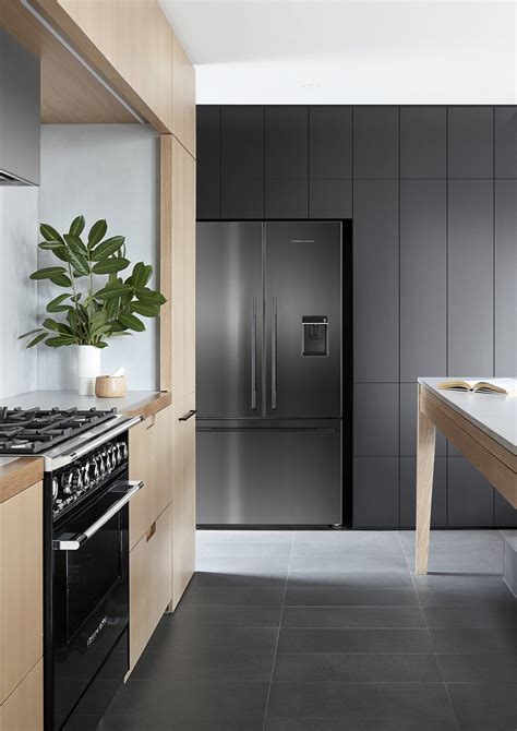 Vintage creamy and grey freestanding kitchen cabinets for a contrasting and bold space. Photo 4 of 8 in An Australian Kitchen Is Reimagined With ...