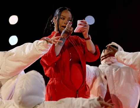 rihanna fans lose it as she whips out fenty powder mid super bowl show metro news