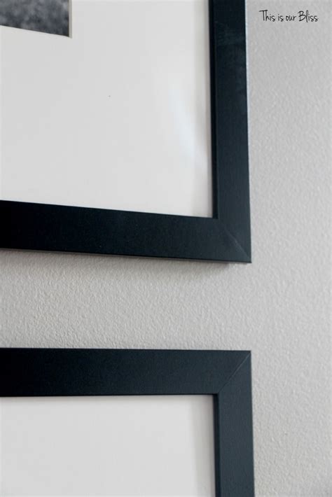 Tips For Hanging A Gallery Wall Of Stacked Frames This Is Our Bliss