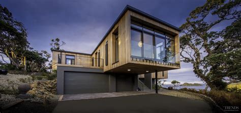 Modern Cantilevered Home Makes The Most Of Coastal Site