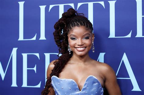 halle bailey celebrates ‘the little mermaid theatrical release with behind the scenes photos