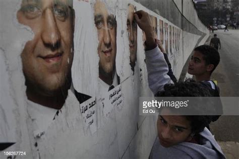 egyptian youth tear down campaign posters for politician ahmed news photo getty images