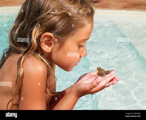 Little Girl Holding A Frog Stock Photo 16469616 Alamy