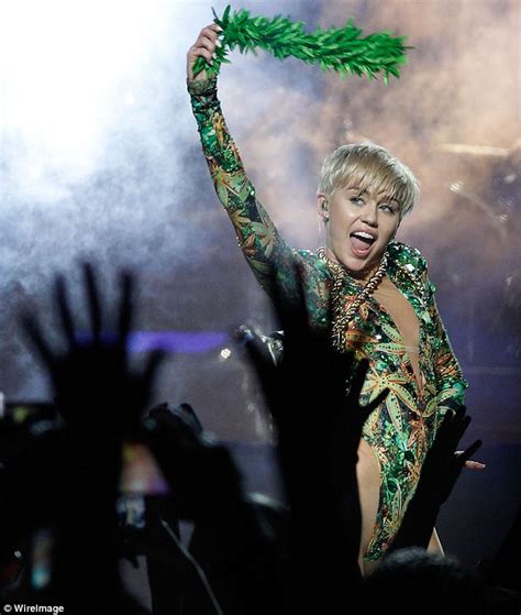 Miley Cyrus Sits Topless As She Gets Blonde Hair Trimmed In Revealing