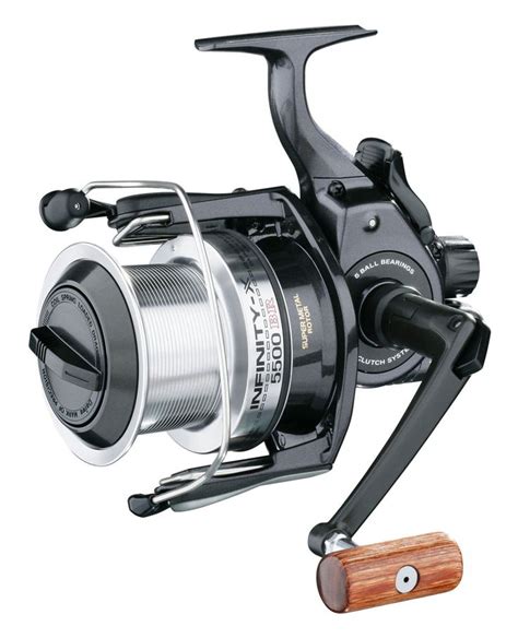 A Spinning Fishing Reel With A Red Handle And Spooly Line Attached To It