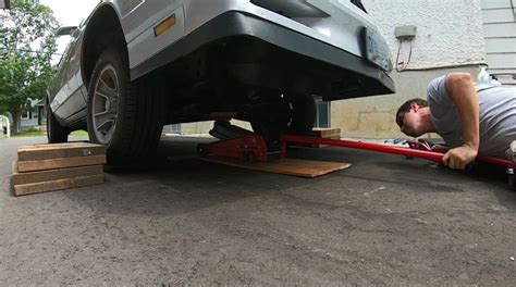 How To Jack Up A Car On A Sloped Driveway Steps Guide