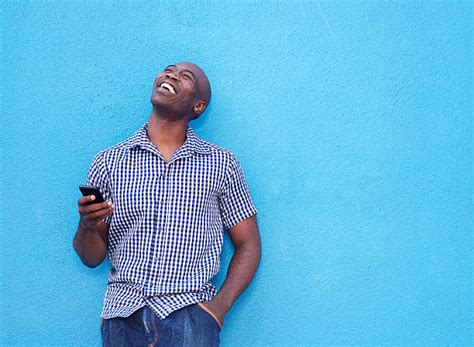 Happy Black Man Holding Phone Stock Photos Pictures And Royalty Free