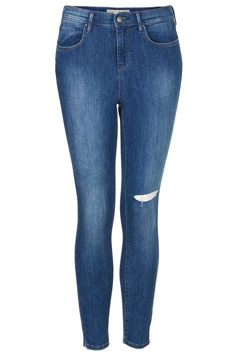 Lyst Topshop Blue Ripped Knee Skinny Jeans In Blue