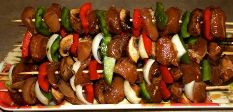 Shish Kebabs Of Pork With Onions And Greens