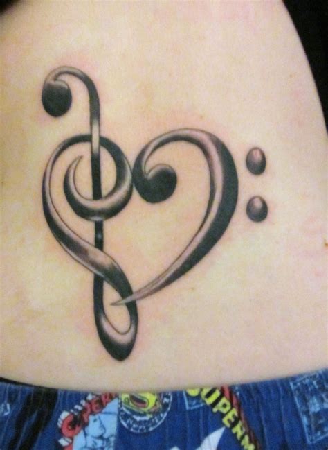 Music lets your imagination fly and takes you to a world where creativity thrives, this is the meaning of the innovative treble clef tattoo carved on back. Pin by Janelle Harrison on Stunning | Tattoos, Sleeve tattoos for women, Tattoo designs