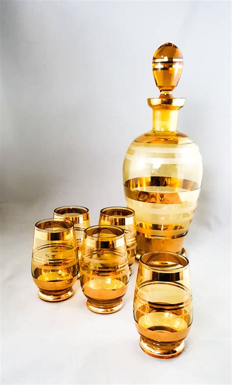 Gorgeous Mid Century Liquor Decanter In Gold And Gilt Glass With Gold Stripes
