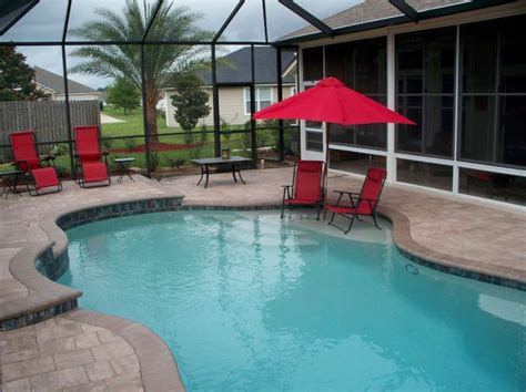 This done on a 22' intex pool.my page. Swimming pool ideas. Sun shelf for chairs, raised beam and ...