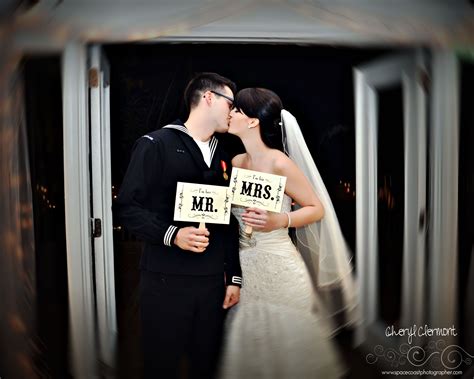 Bride And Groom Kiss At Their Wedding Reception Wedding Photography By