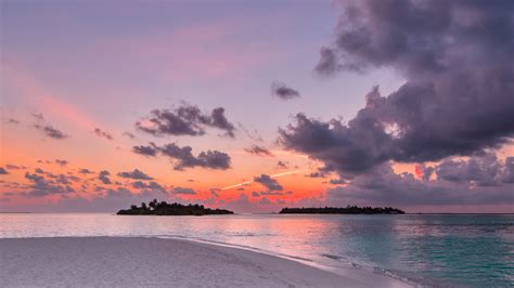 Download 1366x768 wallpaper beach, island, sunset, clouds, nature ...