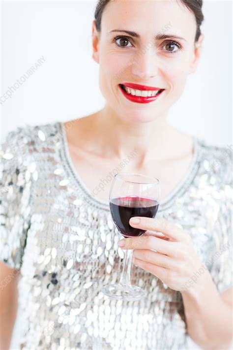 Woman Drinking A Glass Of Red Wine Stock Image C035 2092 Science Photo Library