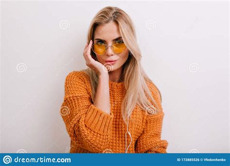 Elegant European Lady In Vintage Yellow Sunglasses Looking With Interest Isolated On White