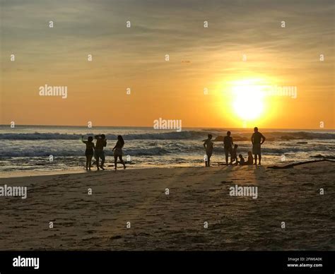 People Enjoying The Sunset From A Beach In Costa Rica Stock Photo Alamy