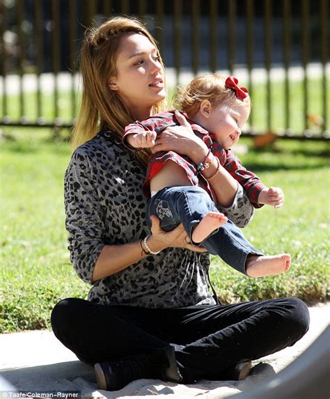 Jessica alba and cash warren stop for a passionate embrace at the playground. Jessica Alba skips the make-up routine for family play ...