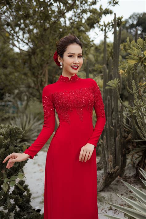 Looking for the definition of ao? Red traditional wedding ao dai with lace on the bust