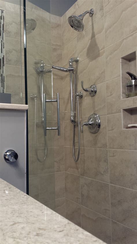 Shower System Included A Stationary Head And Handheld On A Slide Bar A