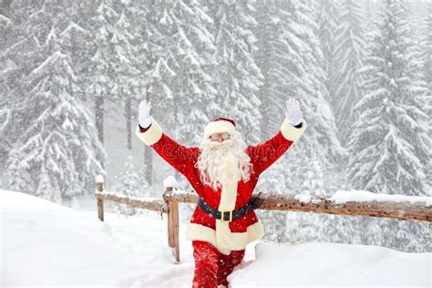 Santa Claus On Snow In Winter At Christmas Stock Photo Image Of Xmas