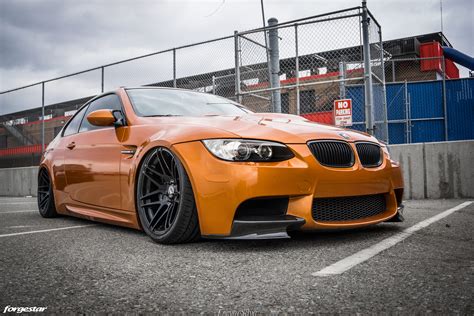 Turbocharged super saloon and heavy. Orange Metallic BMW E92 M3 - Forgestar F14 Wheels