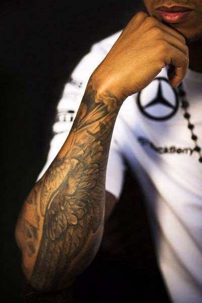 Lewis hamilton has opened up about his array of tattoos, explaining the reasoning behind the art which is, as he says, very meaningful. Lewis Hamilton | Hamilton tattoos, Sleeve tattoos