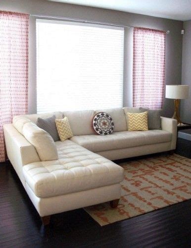 Still the neutral colors help it blend in seamlessly with the rest of the furniture and decor. For the family room. Cream leather sectional- Simple ...