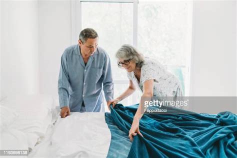 Man Changing Bed Sheets Photos And Premium High Res Pictures Getty Images