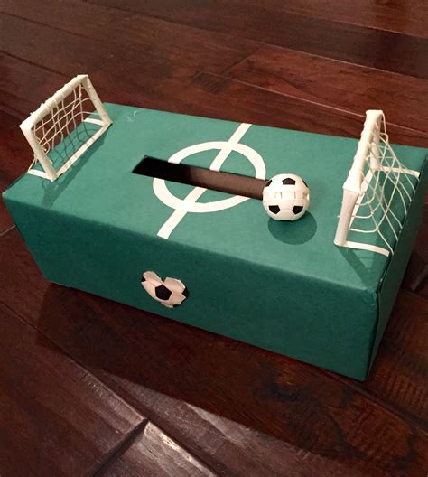 A place to decorate our boxes {wrapping paper and tape}. Valentine's box soccer field | Boys valentines boxes ...