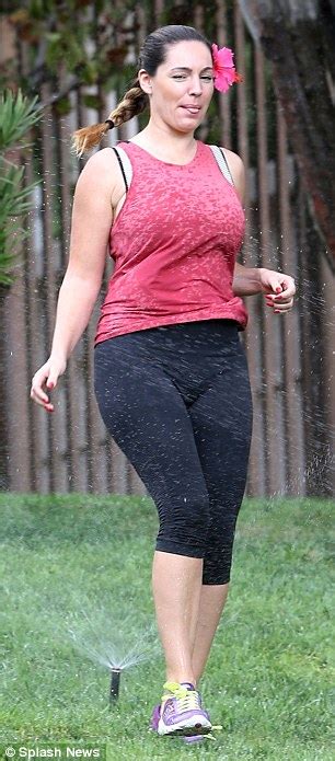 Kelly Brook Gets A Soaking As She Runs Through Sprinklers Daily Mail