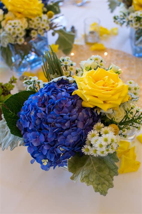 Yellow Rose And Blue Hydrangea Centerpiece With White Aster Blue