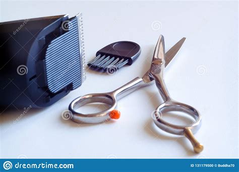 Trimmer Scissors And Comb Hair Clippers And Comb Isolated On White