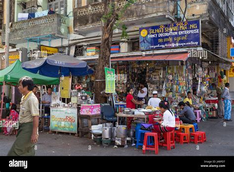People Shops And Simple Stall Selling Food At The Corner Of Maha